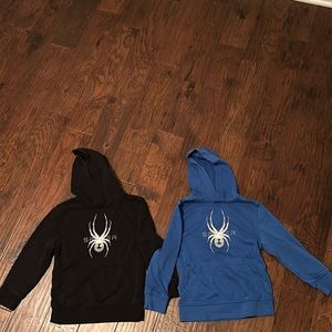 Two (2) Spider Hoodies - Black and Blue. Size XS 5/6